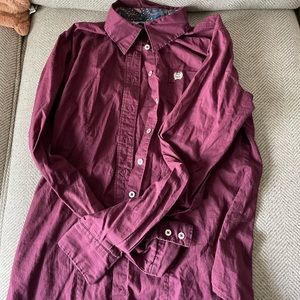 Cinch button up fits more like a Small